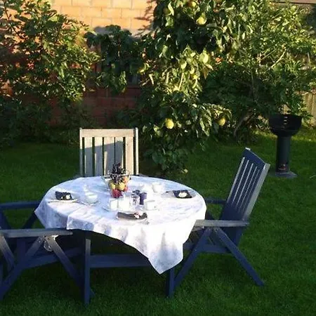 With A Broad View Over The Hilly Landscape *